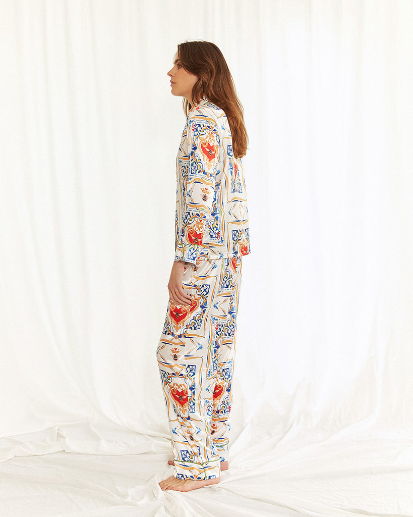 Bella Descanso luxury sleepwear. Palazzo satin pyjama set. Stylish loungewear featuring blue, red and designer-inspired bees. 
